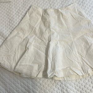 White linen pleaded top skirt with lining.